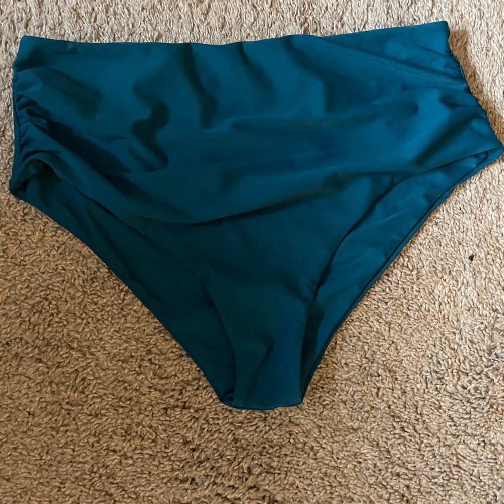 New high waisted swim bottom. Very flattering. Size XL